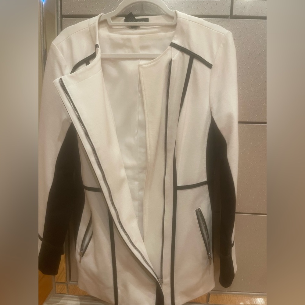 Nice brand new black and white long jacket. N